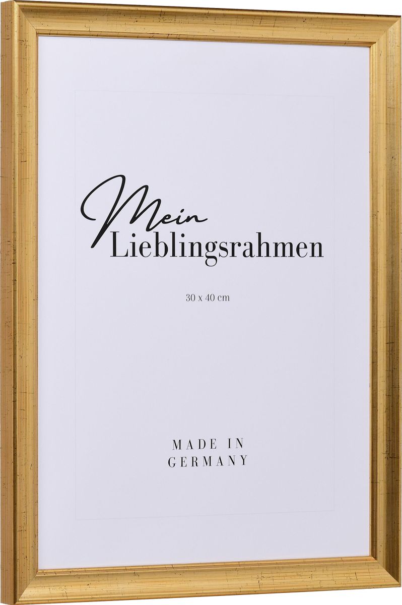 Seitenansicht eines altgoldfarbenen Bilderrahmens mit einer durch ein PrÃ¤gerad aufgebrachten OberflÃ¤che und einem Perlstab
