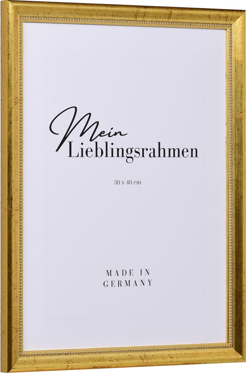 Seitenansicht eines goldenen Holzrahmens mit von Hand aufgebÃ¼rsteten Schlagmetall und einem Perlstab an der Innenkante