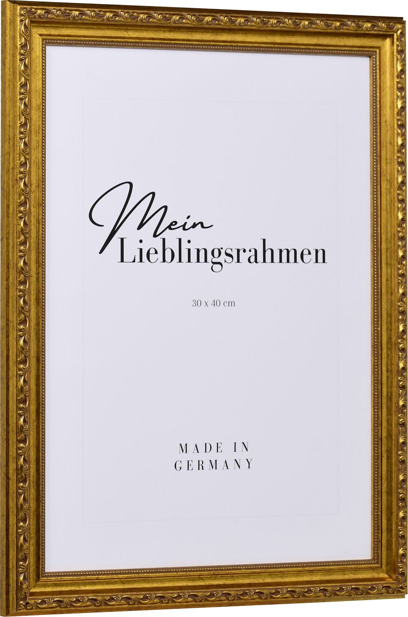 Seitenansicht eines verspielten, altgoldfarbenen, barocken Holzrahmens mit floralen Ornamenten und einen zarten Perlstab