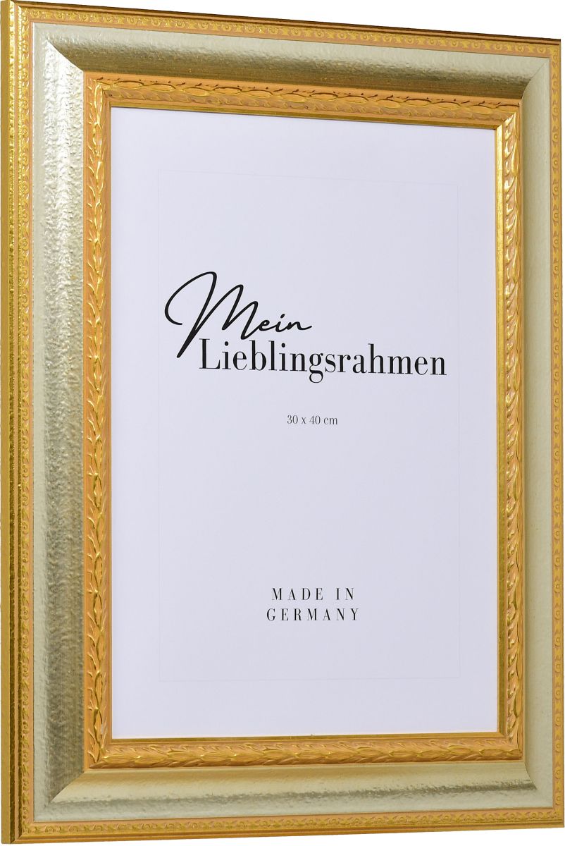 Seitenansicht eines silbernen, pompÃ¶sen Bilderrahmens mit detailreichen Barockapplikationen