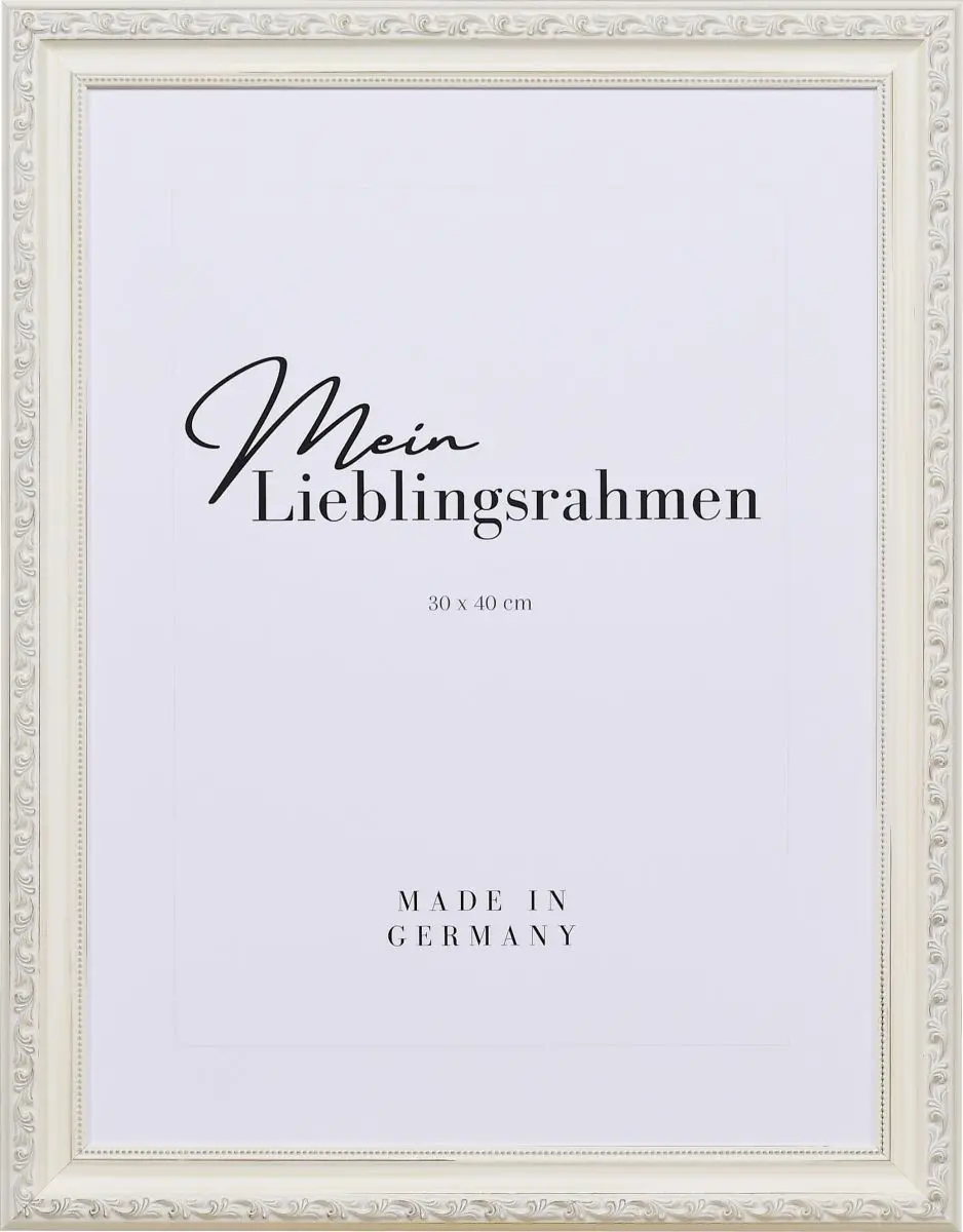 Frontansicht eines weissen, verspieltem, barocken Holzrahmens mit floralen Ornamenten und einen zarten Perlstab