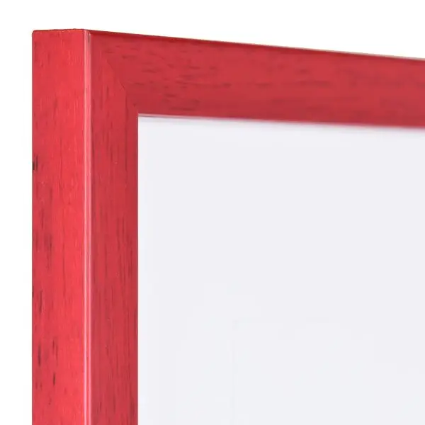 Ansicht der Ecke eines schmalen, rot lackierten Bilderrahmens mit sichtbarer Holzstruktur und glatter OberflÃ¤che